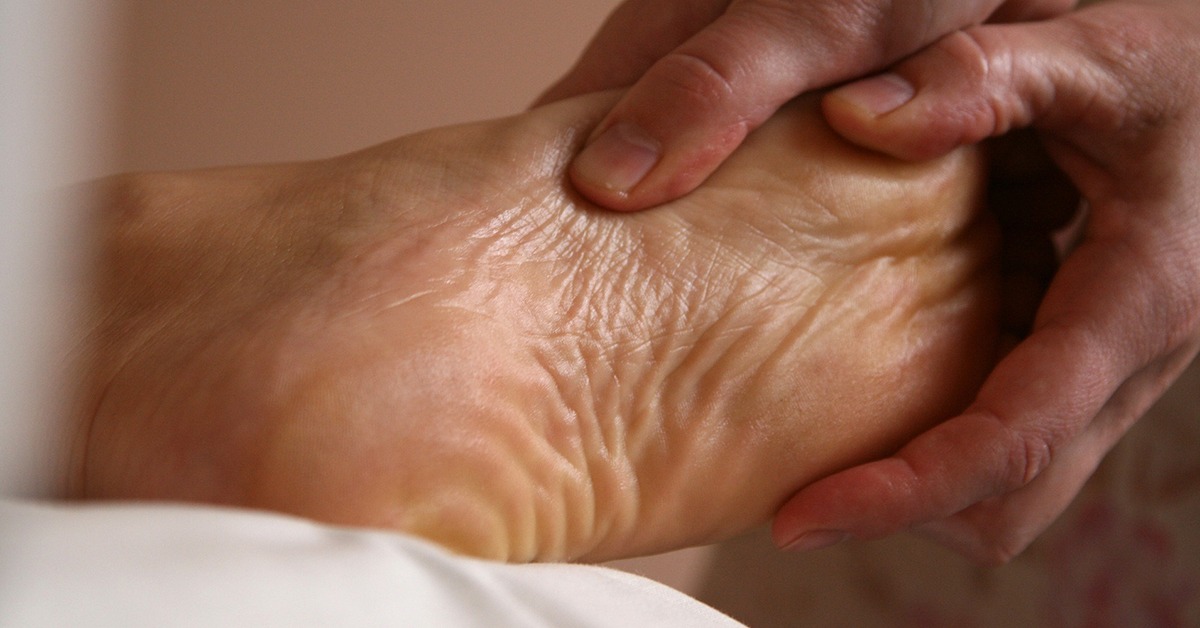 Therapist performing Foot Reflexology Massage